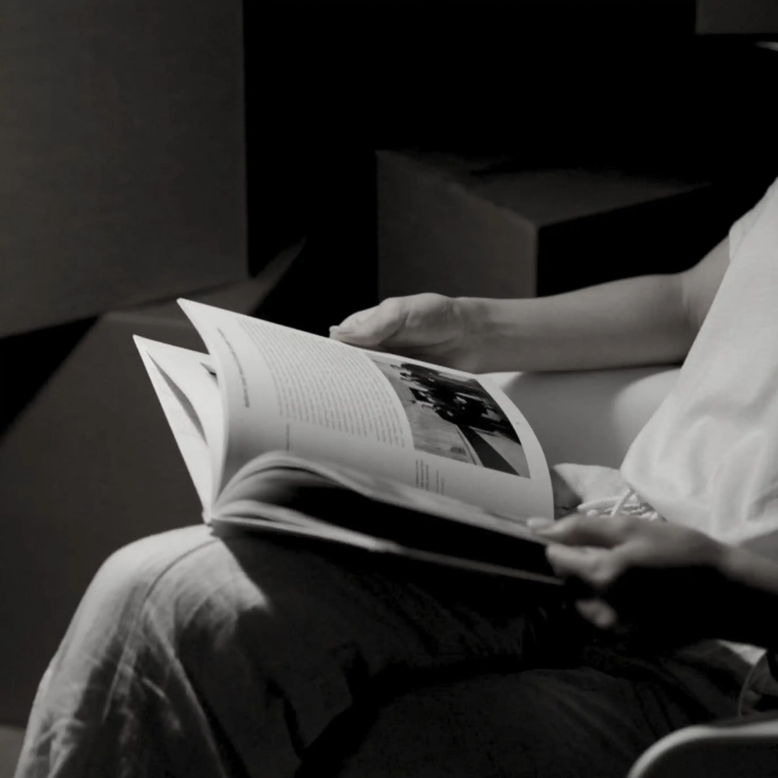 Person reading Kaluna Bali property and investment guide